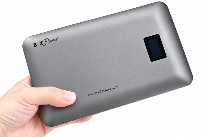 Compact BiXPower VP250 211Wh portable battery held in hand showing its slim size